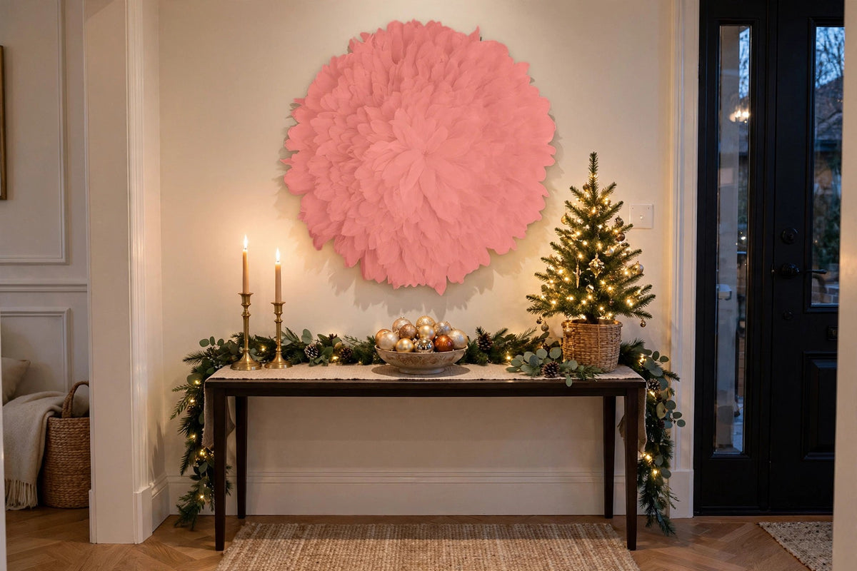 African JuJu Hat Feather Wall Art and Decor - Large - Apricot Blush hung on a wall in a holiday-decorated room