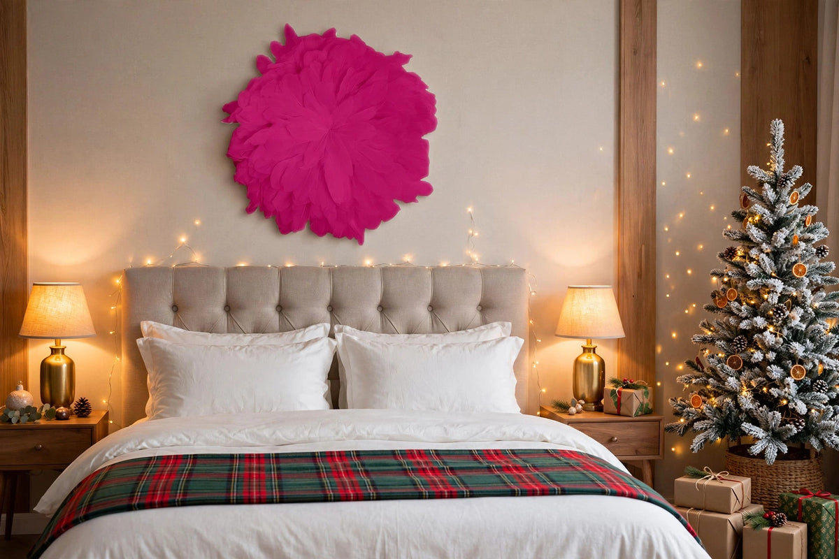 African JuJu Hats Feather Wall Art - Small - Fluorescent Fuchsia hung on a wall in a holiday-decorated room