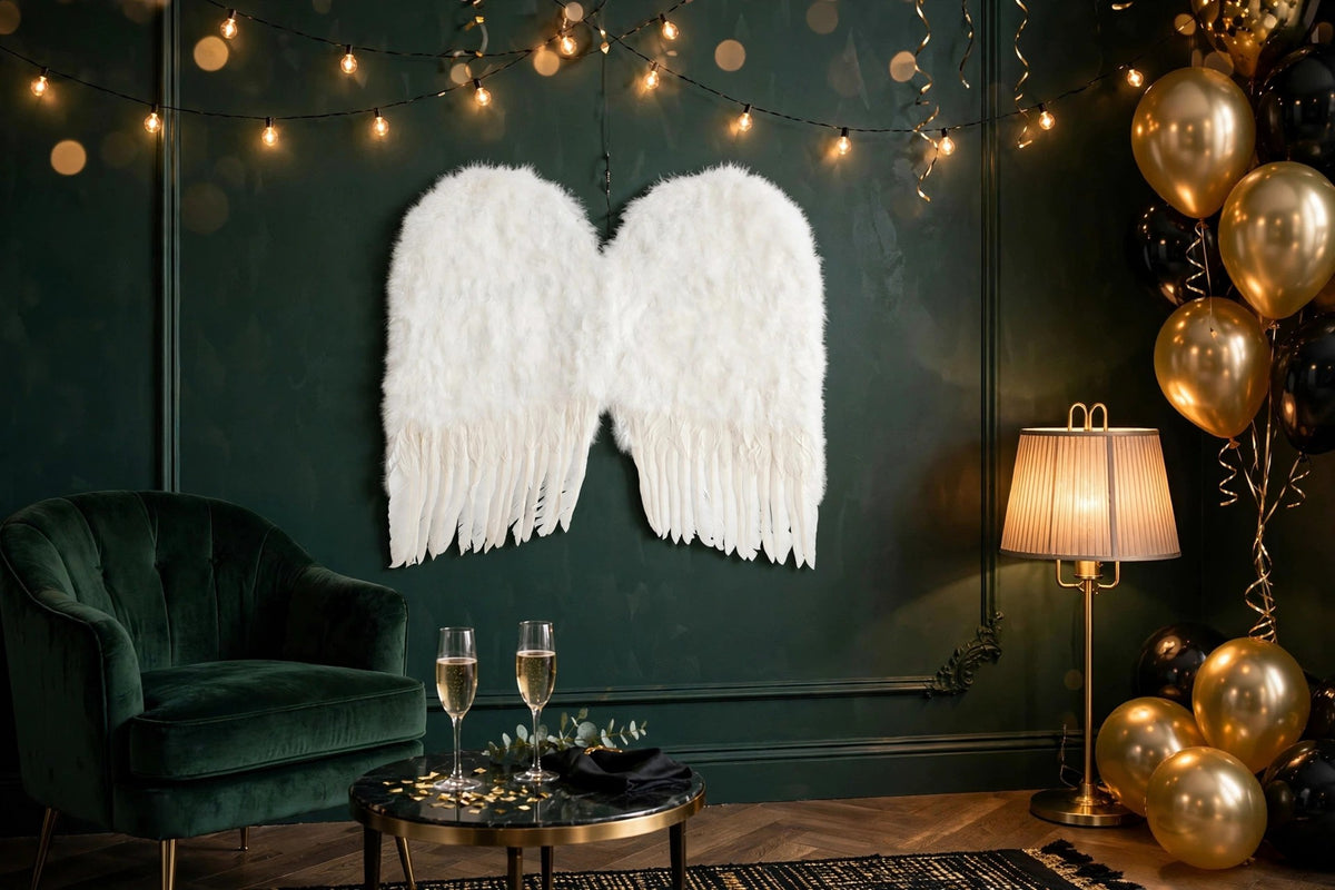 Medium Angel Costume Wings - White hung on a wall in a holiday-decorated room