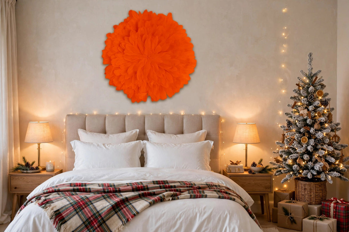 Unique Decorative Feather Wall Art Inspired by African JuJu Hats - Orange hung on a wall in a holiday-decorated room