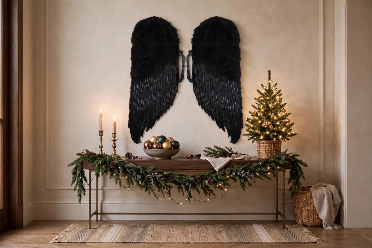 Adult Black Angel Costume Wings - Large Halloween Cosplay Feather Wing hung on a wall in a holiday-decorated room