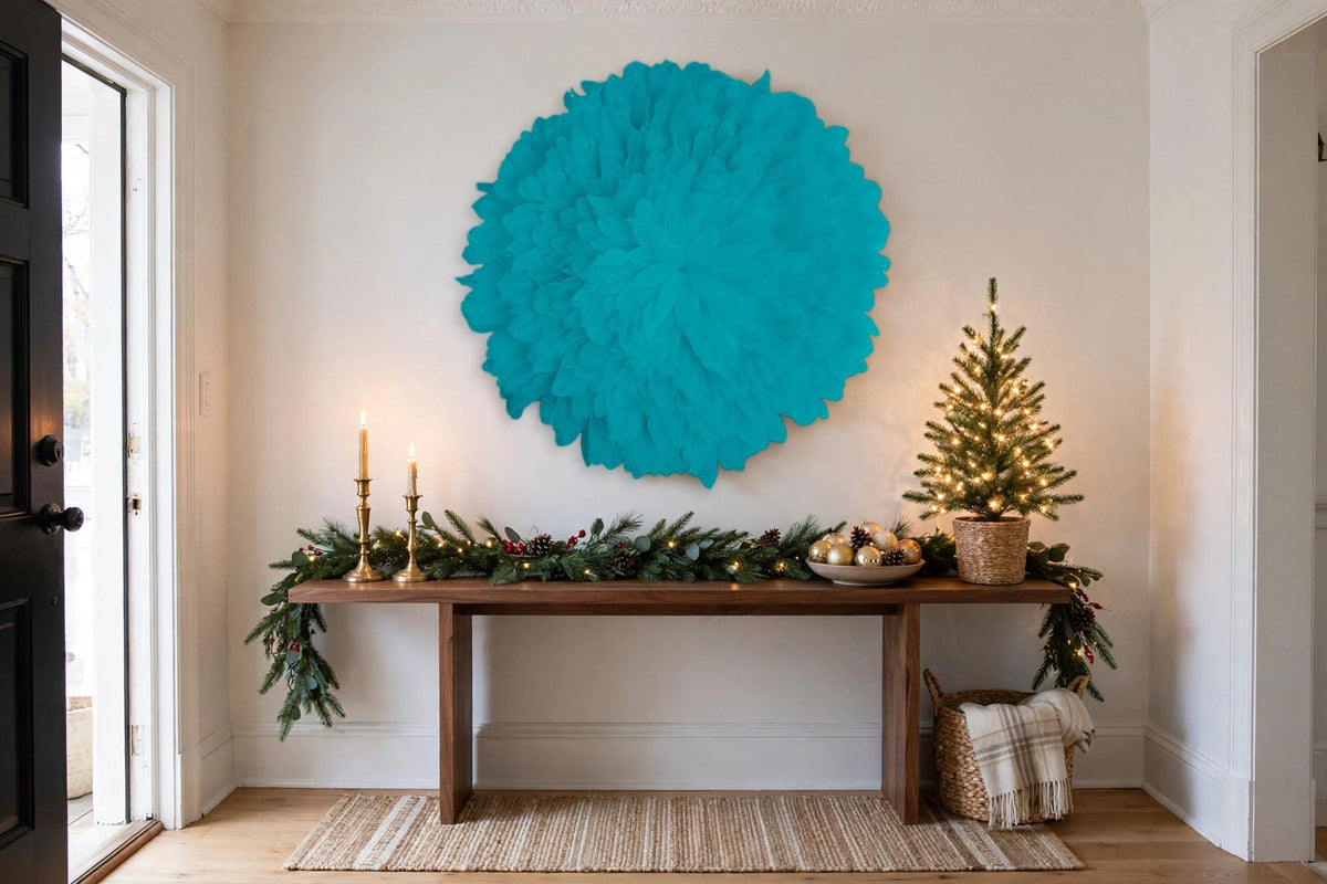 African JuJu Hat Feather Wall Art and Decor - Large - Light Turquoise hung on a wall in a holiday-decorated room