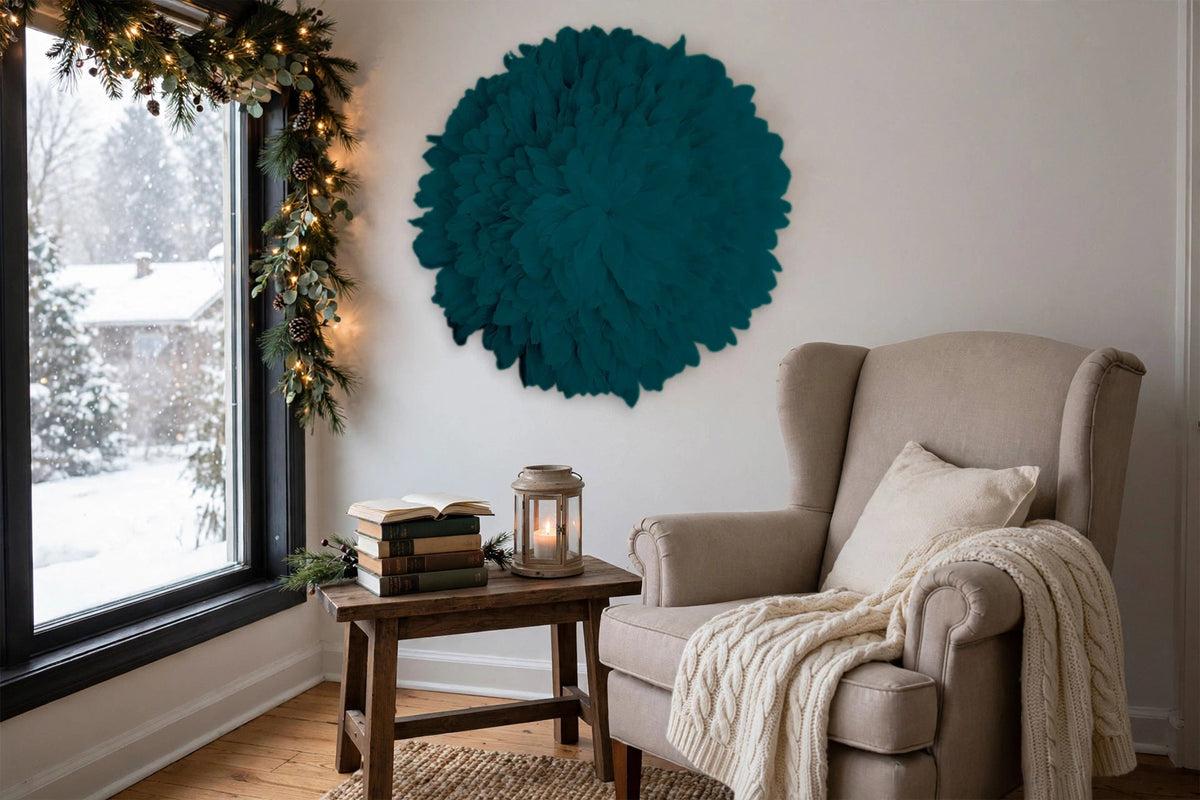 African JuJu Hat Feather Wall Art and Decor - Large - Peacock Blue hung on a wall in a holiday-decorated room