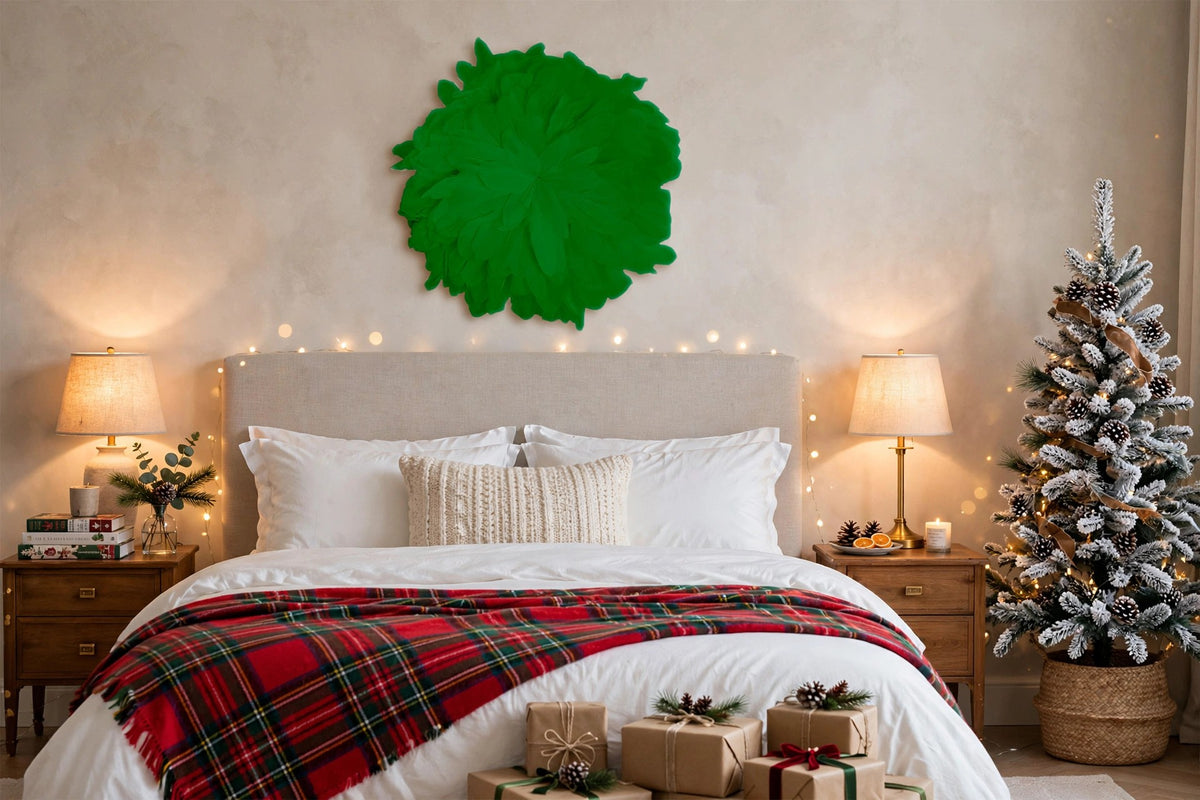 African JuJu Hats Feather Wall Art - Small - Kelly hung on a wall in a holiday-decorated room
