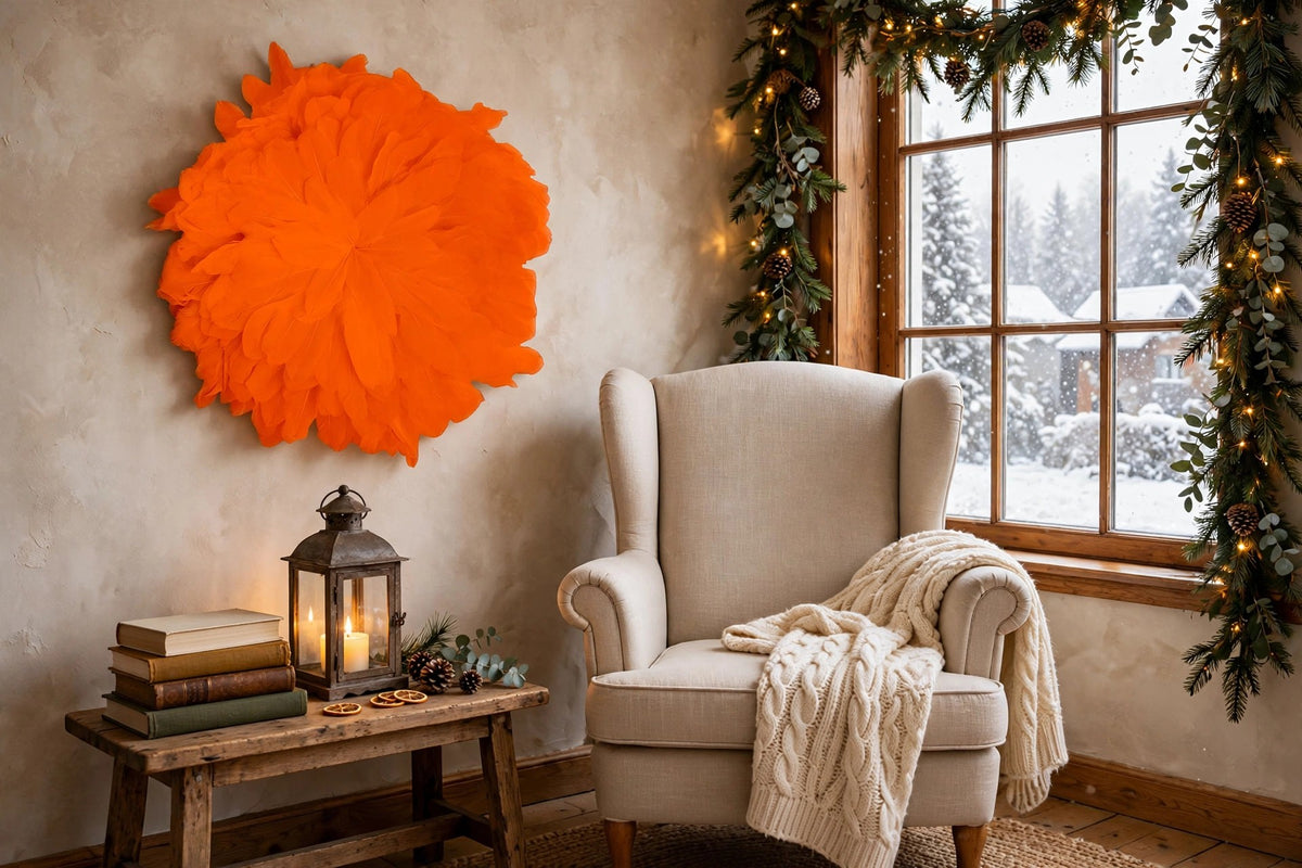 African JuJu Hats Feather Wall Art - Small - Orange hung on a wall in a holiday-decorated room
