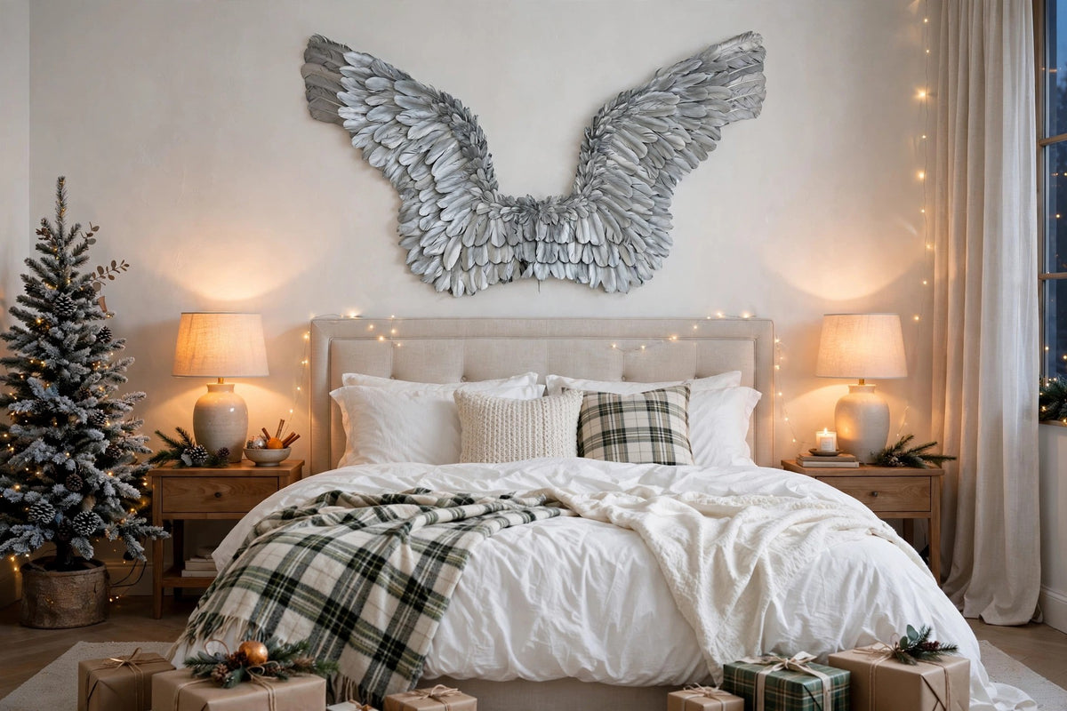 Giant Metallic Silver Wings hung on a wall in a holiday-decorated room