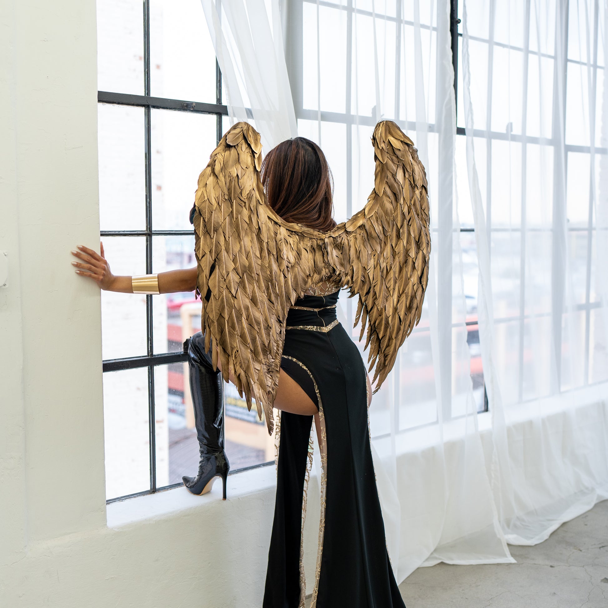 Our Large Metallic Gold Angel Wings make a statement for Hal