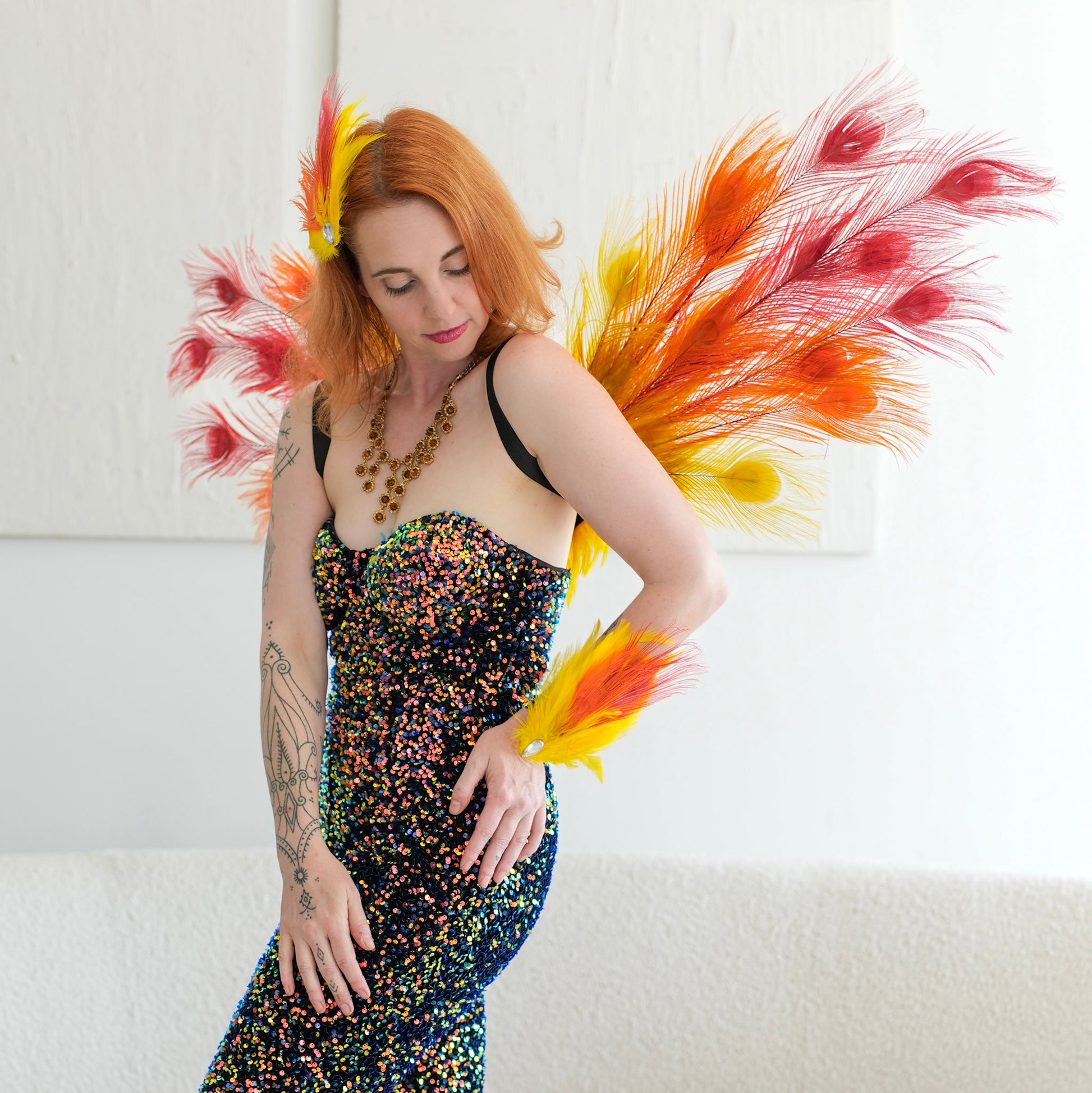 Orange Yellow and Red Peacock Fairy Wings | Peacock Feather Costume Zucker Feather Products, Inc. Orange Yellow and Red Peacock Fairy Wings | Peacock Feather Costume Zucker Feather Products, Inc.
