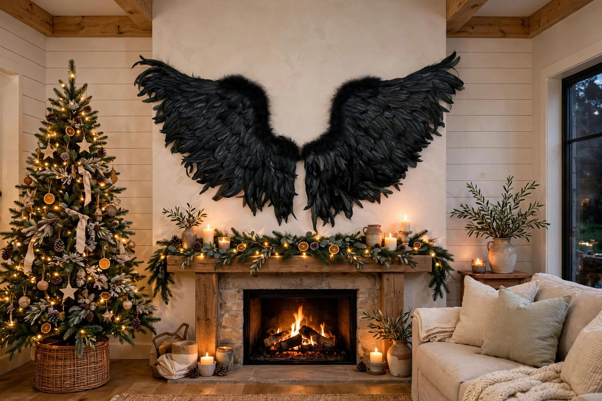 Large Black Angel Wings hung on a wall in a holiday-decorated room
