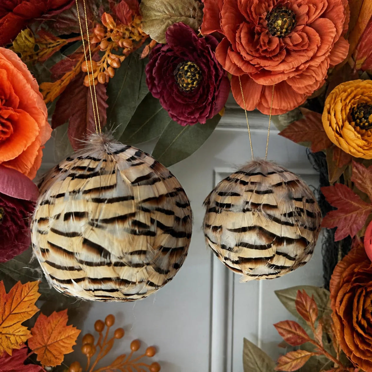 Natural partridge feather ornaments 3" and 4" on a fall wreath