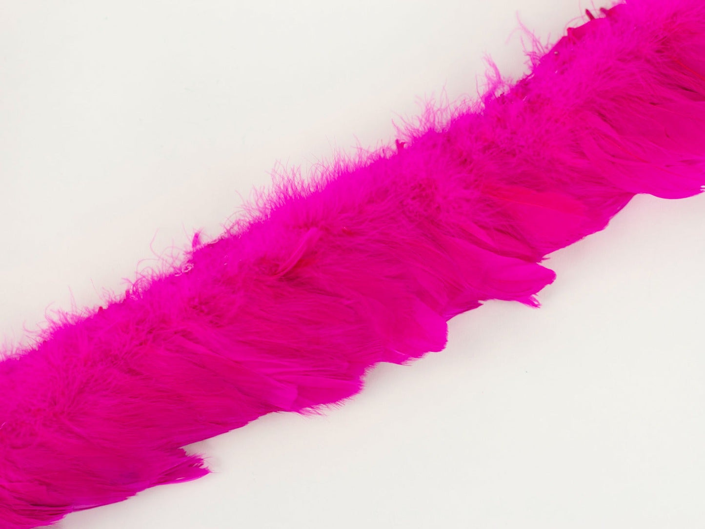 Strung Goose Coquille Feathers 3-4" -- 1/4 lb-Shocking Pink