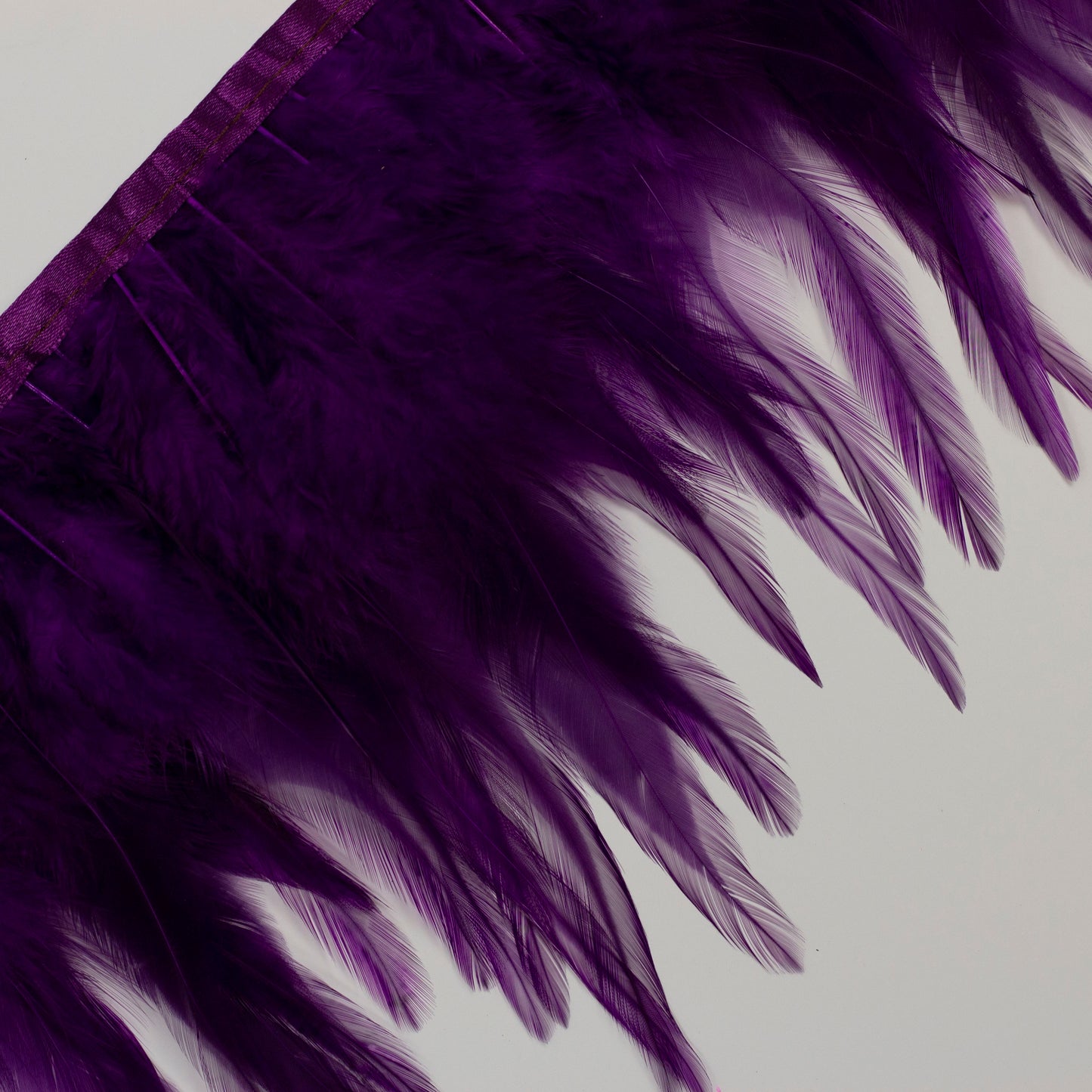 Rooster Saddle Fringe With Bias 6-8 inch   1yd Bolt --Purple