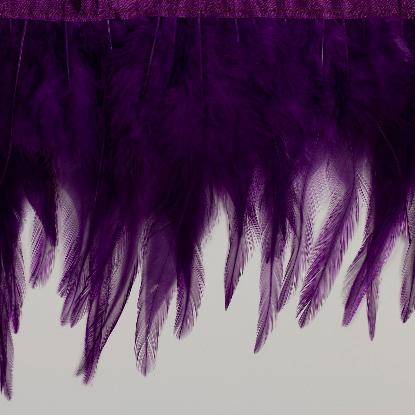 Rooster Saddle Fringe With Bias 6-8 inch   1yd Bolt --Purple