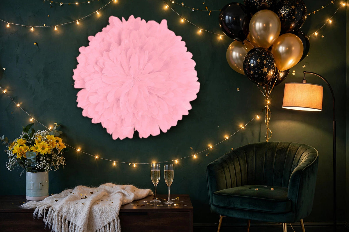 Unique Decorative Feather Wall Art Inspired by African JuJu Hats - Candy Pink hung on a wall in a holiday-decorated room